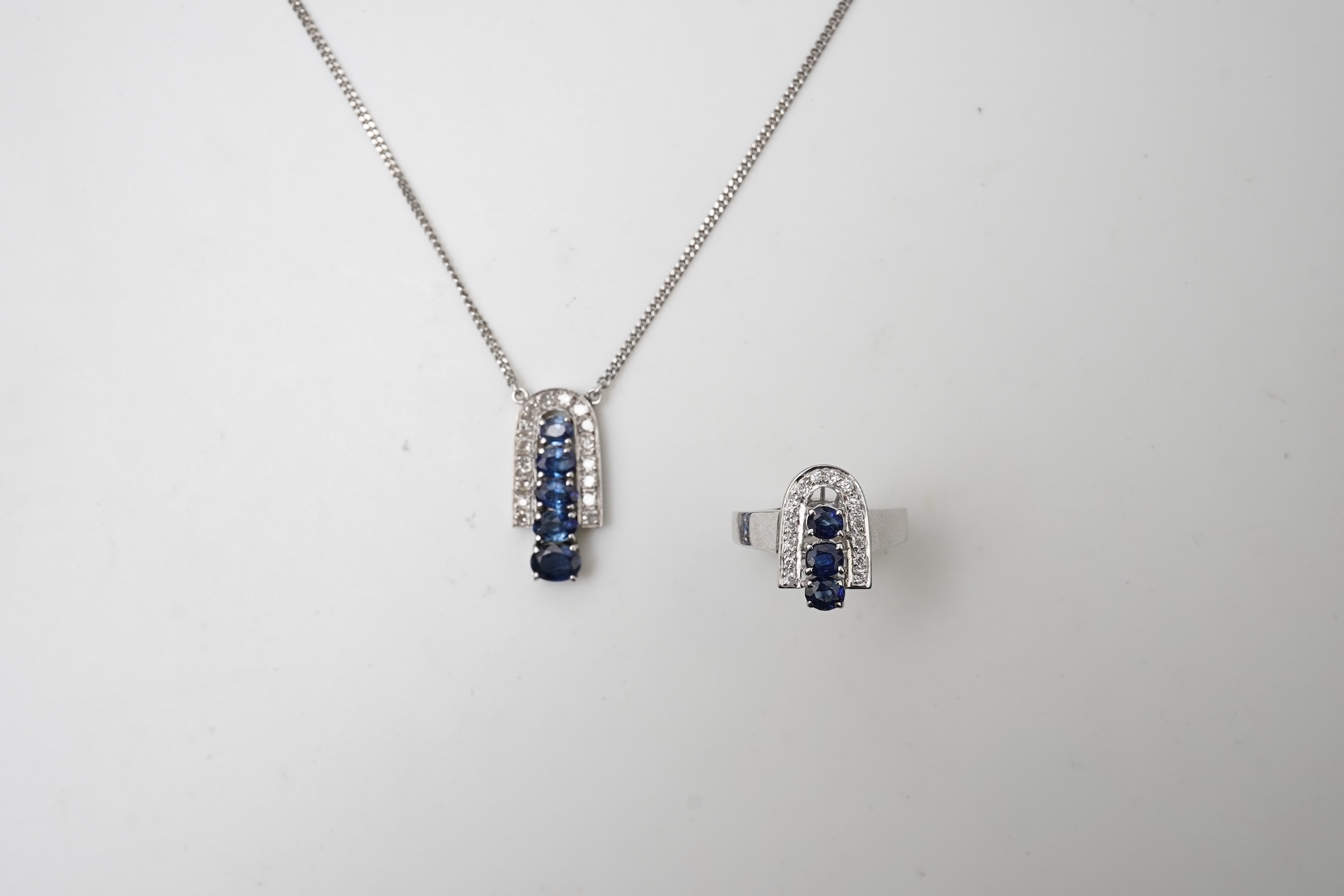 A sapphire and diamond demi-parure